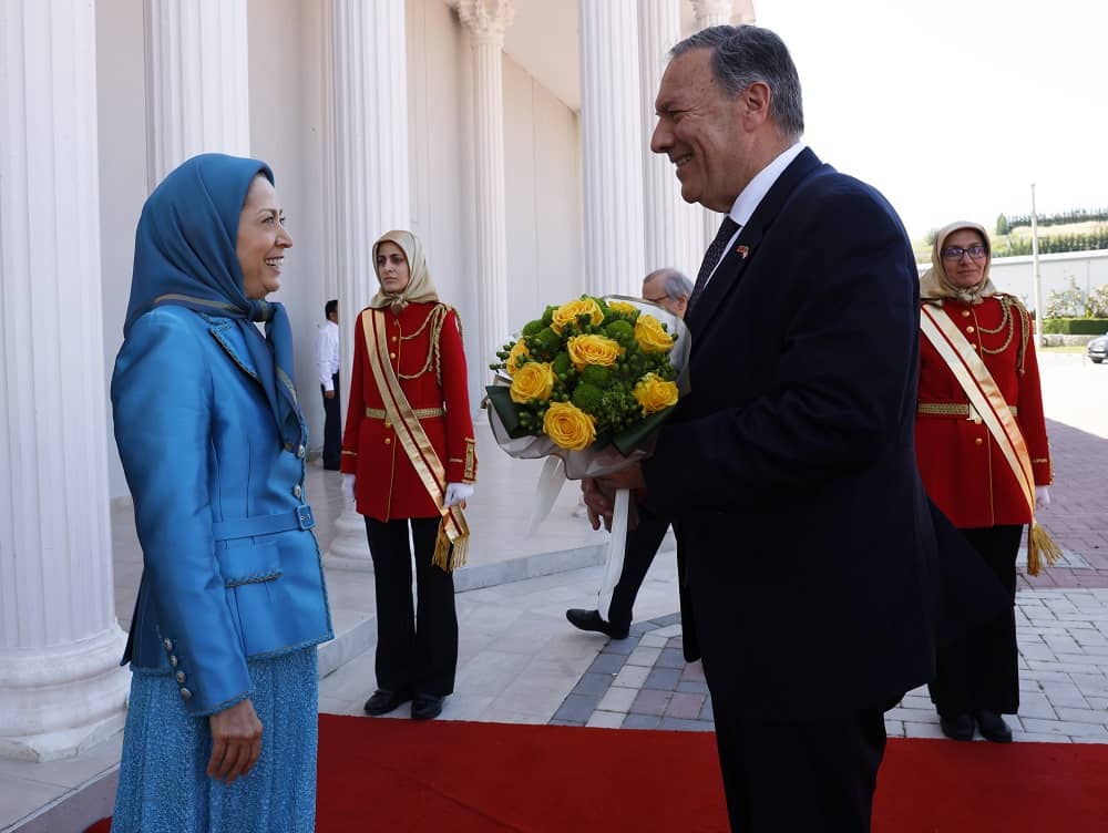 Ashraf-3, Albania, May 16, 2022 – Maryam Rajavi, the President-elect of the National Council of Resistance of Iran (NCRI), welcoming Secretary Michael Pompeo at the entrance to the Museum of “120 Years of Struggle for Freedom in Iran.” Secretary Pompeo visited Ashraf-3, home to thousands of members of the principal opposition movement, the Mujahedin-e Khalq (PMOI/MEK) in Manëz, Albania.